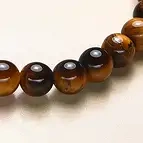 Tigerauge Edelsteinkugel für Stärke und Schutz