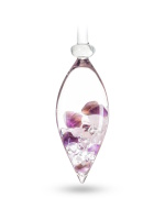 Nahaufnahme der VitaJuwel WELLNESS Phiole mit sichtbaren Edelsteinen Amethyst, Rosenquarz und Bergkristall